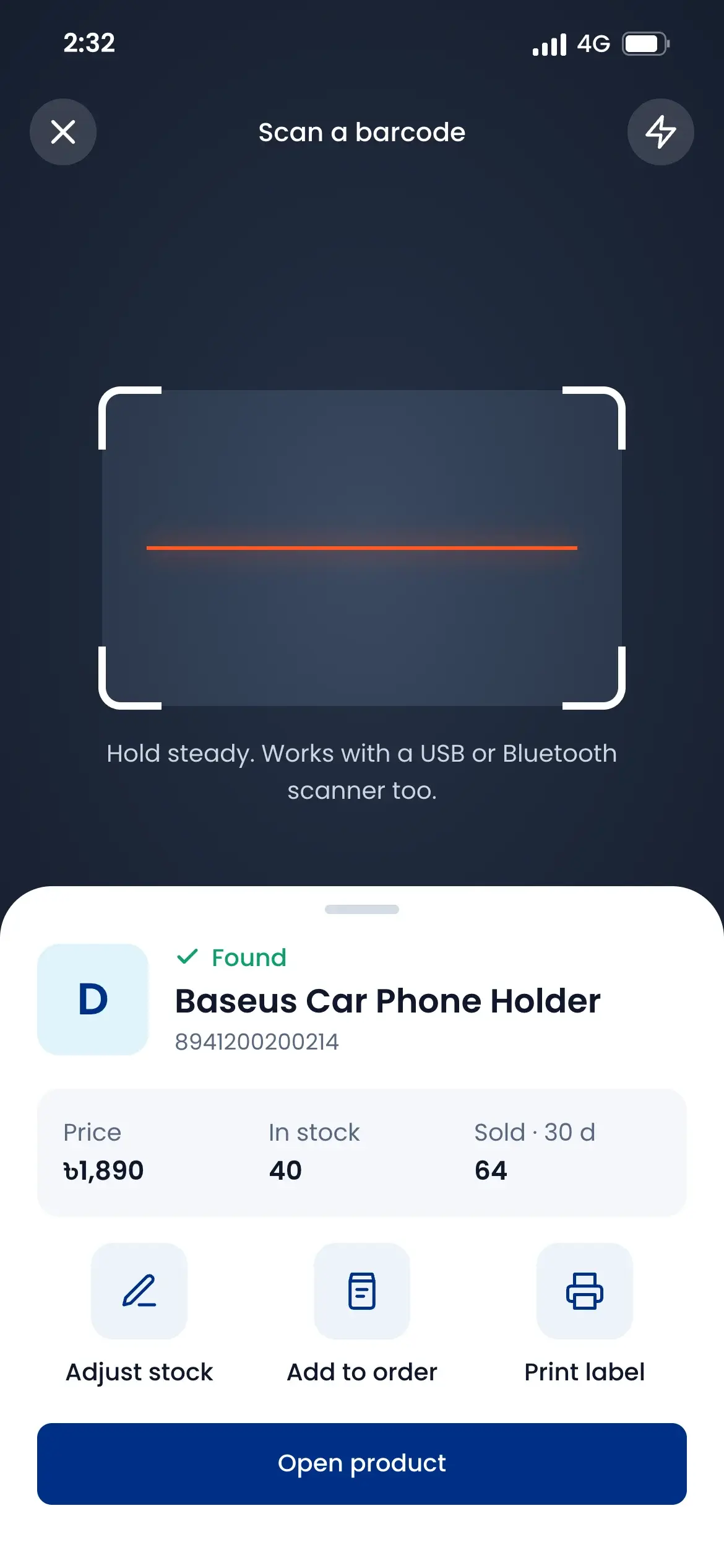 Scanning a barcode on the phone shows the product, its price, stock and sales